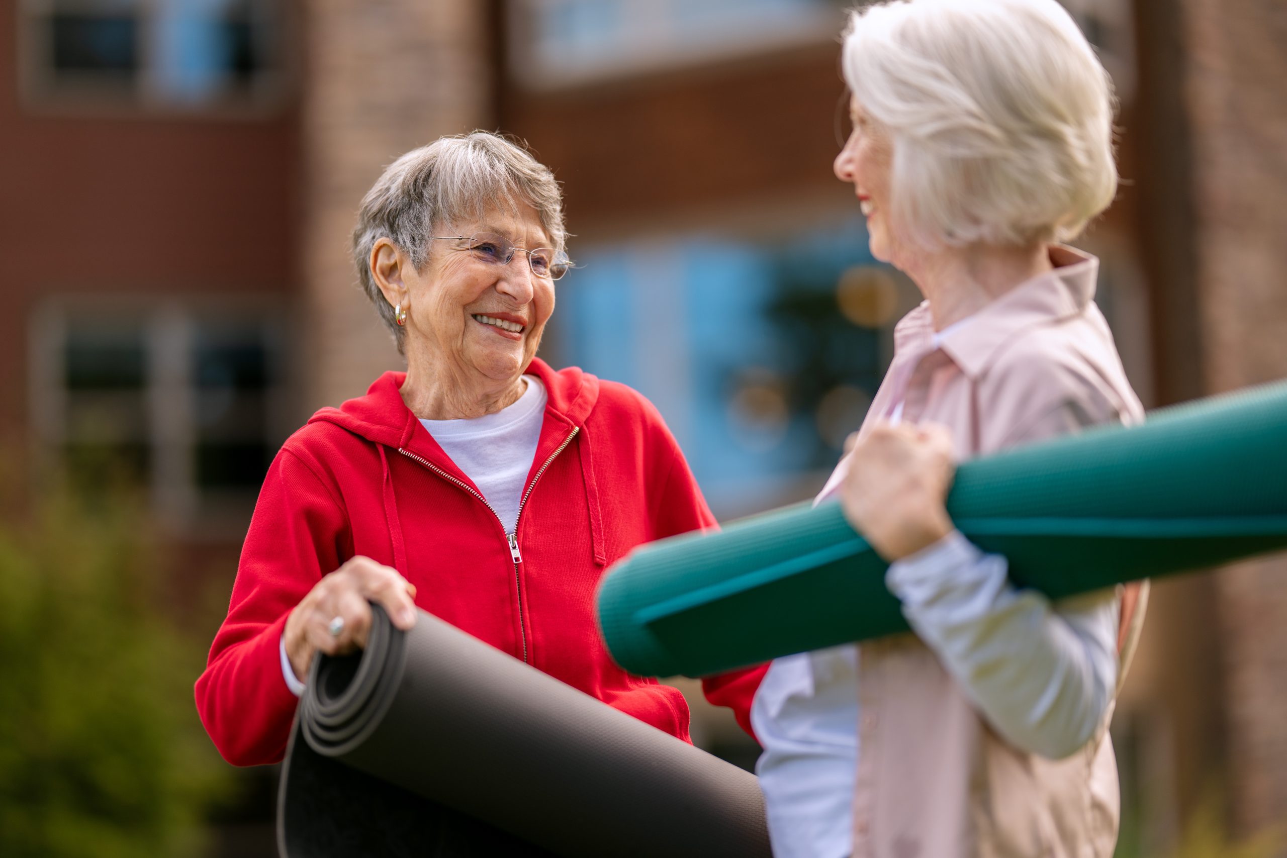 Residents with yoga mats